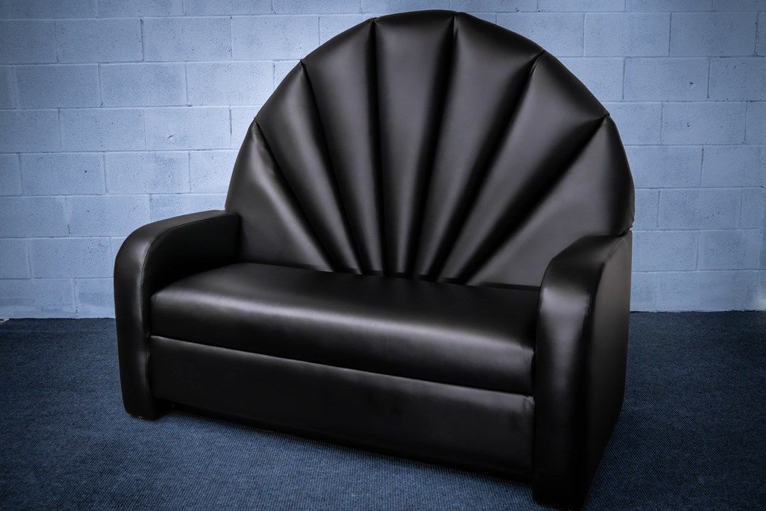 love seat vertical channel back in black vinyl front view