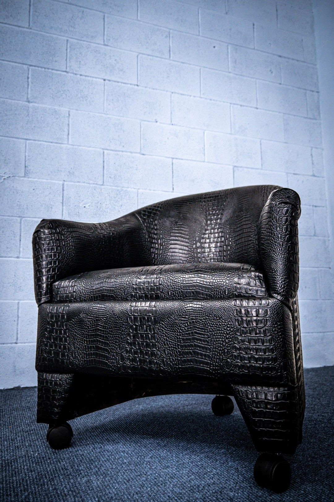 Black crock vinyl barrel chair 