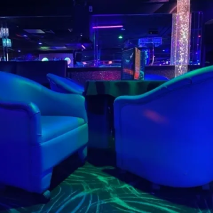 blue barrel nightclub chairs in gentleman's club