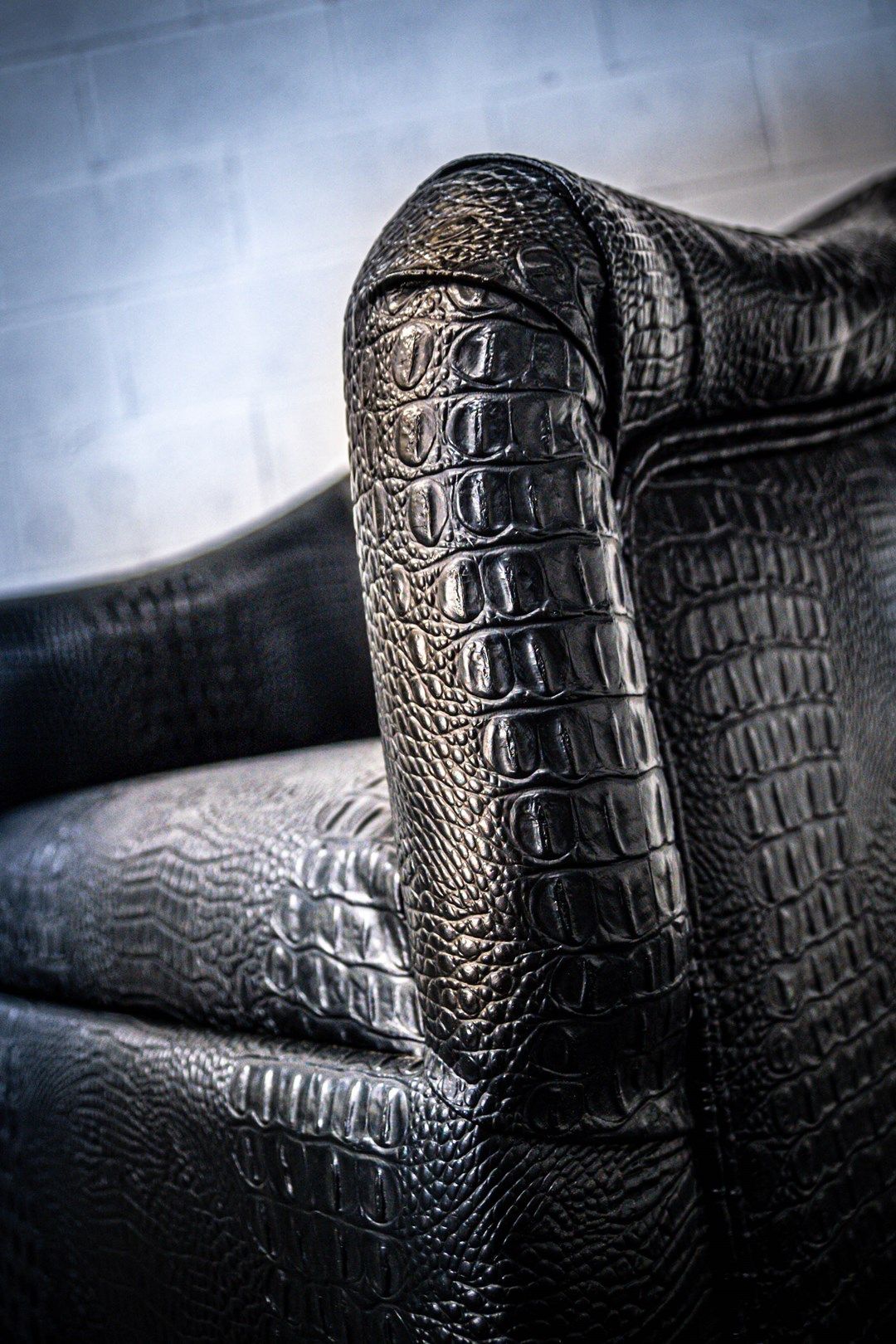 Barrel chair side detail black crock skin